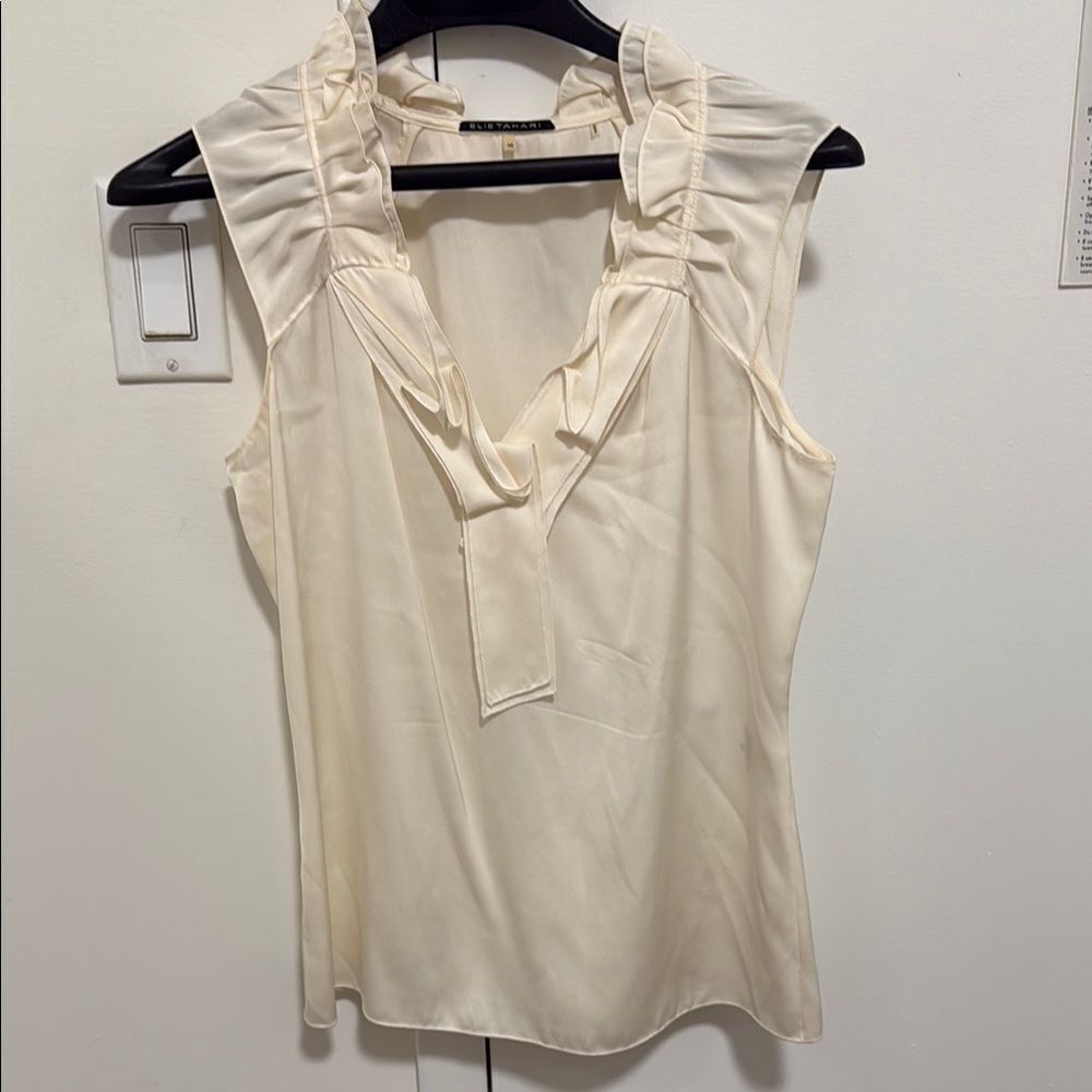 NWOT Elie Tahari Sleeveless V Neck Silk Blouse with Collar Ruffle in Off White.